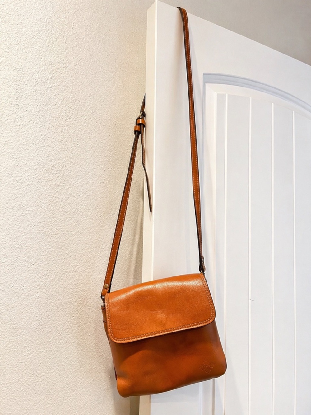 Patricia Nash genuine leather bag in a rich cognac brown tone